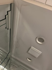 Ceiling leaking over garden tub in room #353