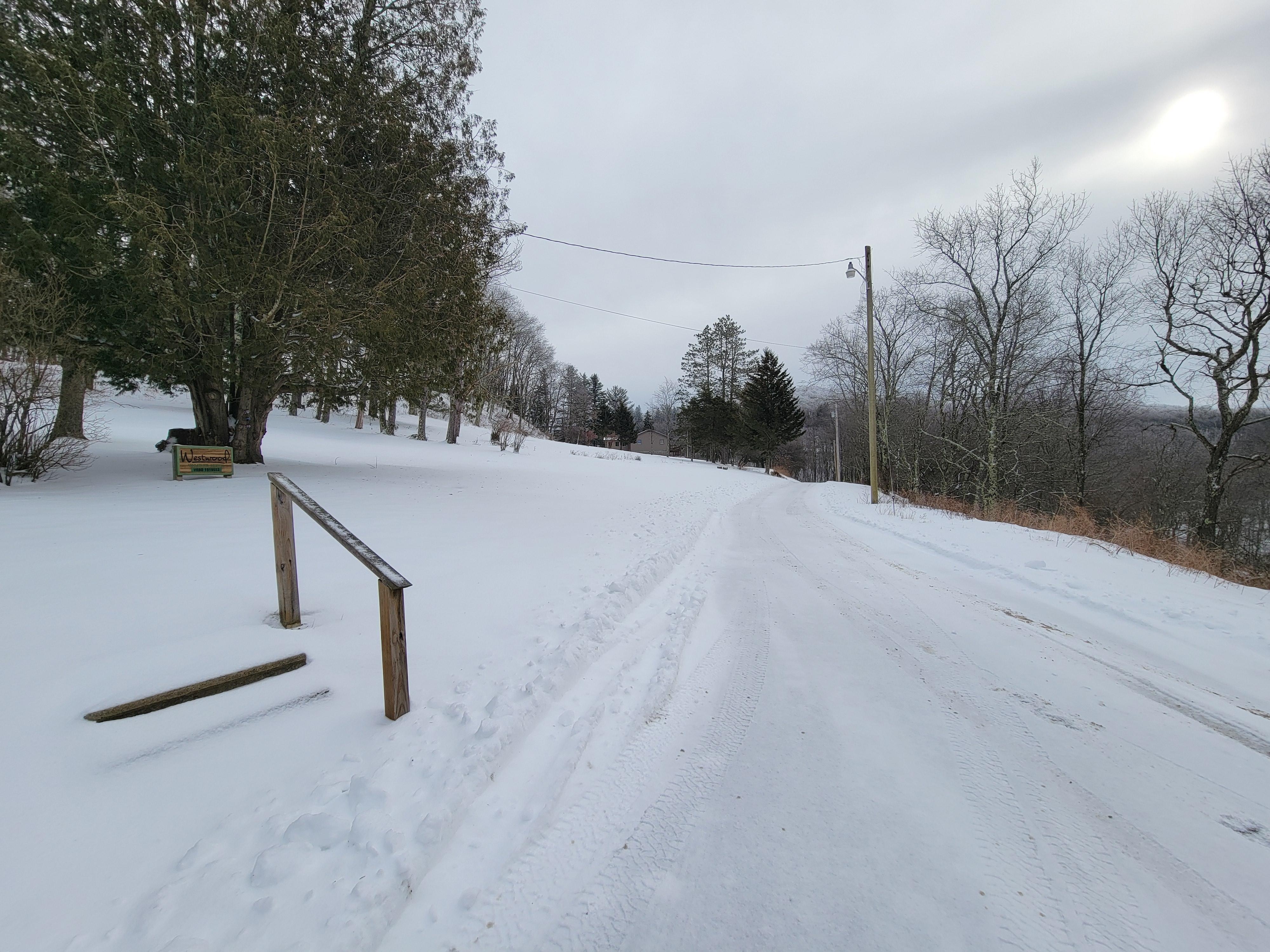 Roadway/Driveway - park close to the steps in the winter so that the plow driver can turn around.