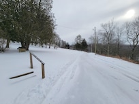 Roadway/Driveway - park close to the steps in the winter so that the plow driver can turn around.