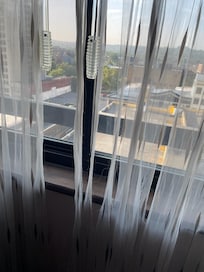 Shredded curtains in the room