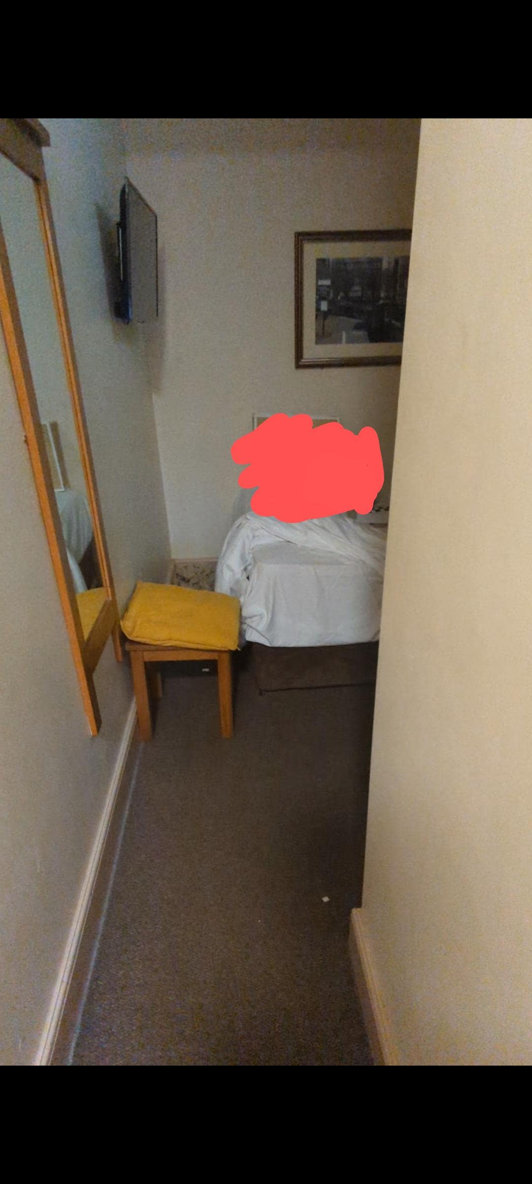 To give idea of size, double bed against the wall 