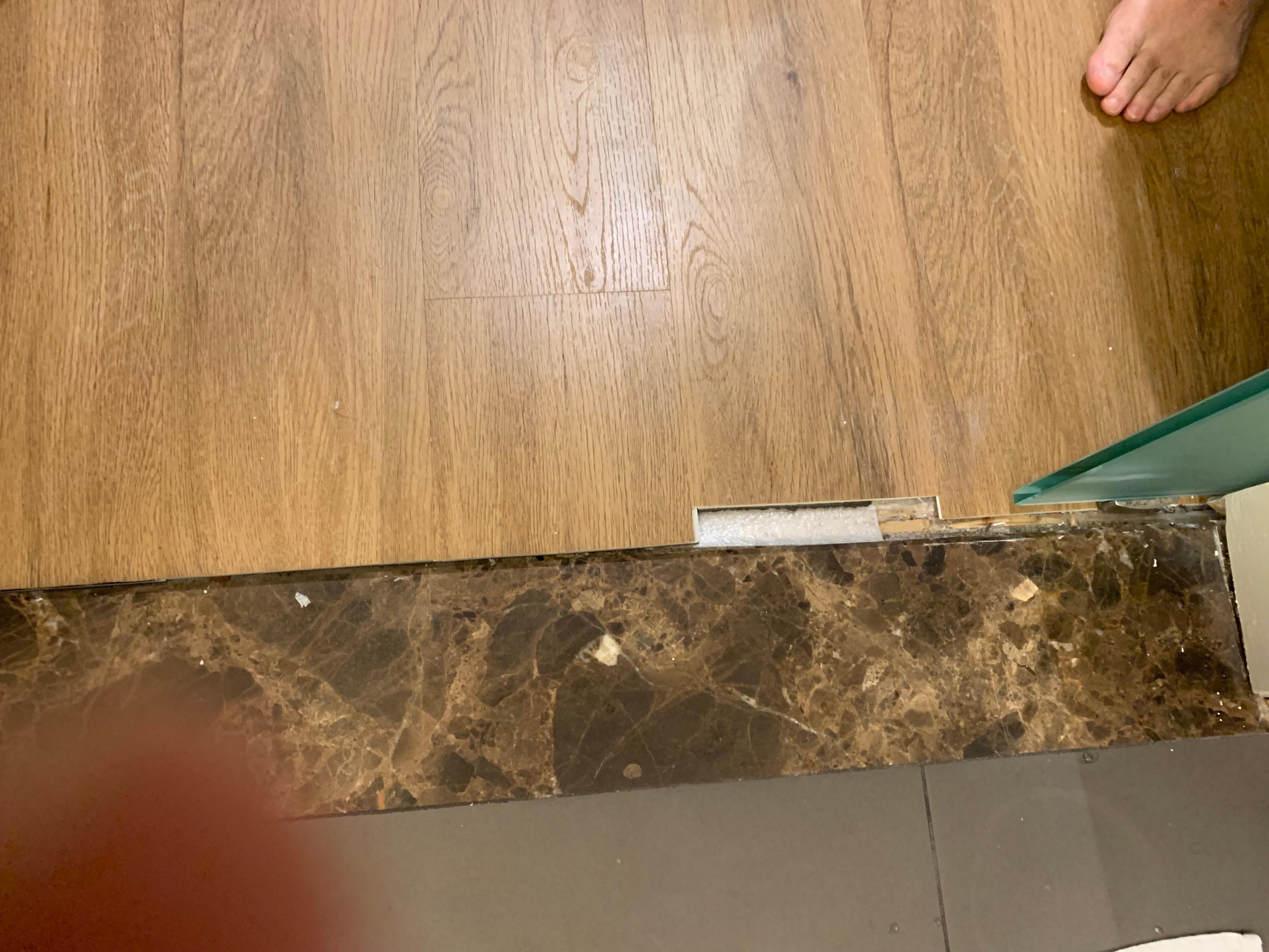 Gap betaen bathroom times and floor