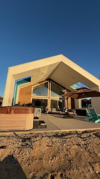 Photo of the back of the home from the beach