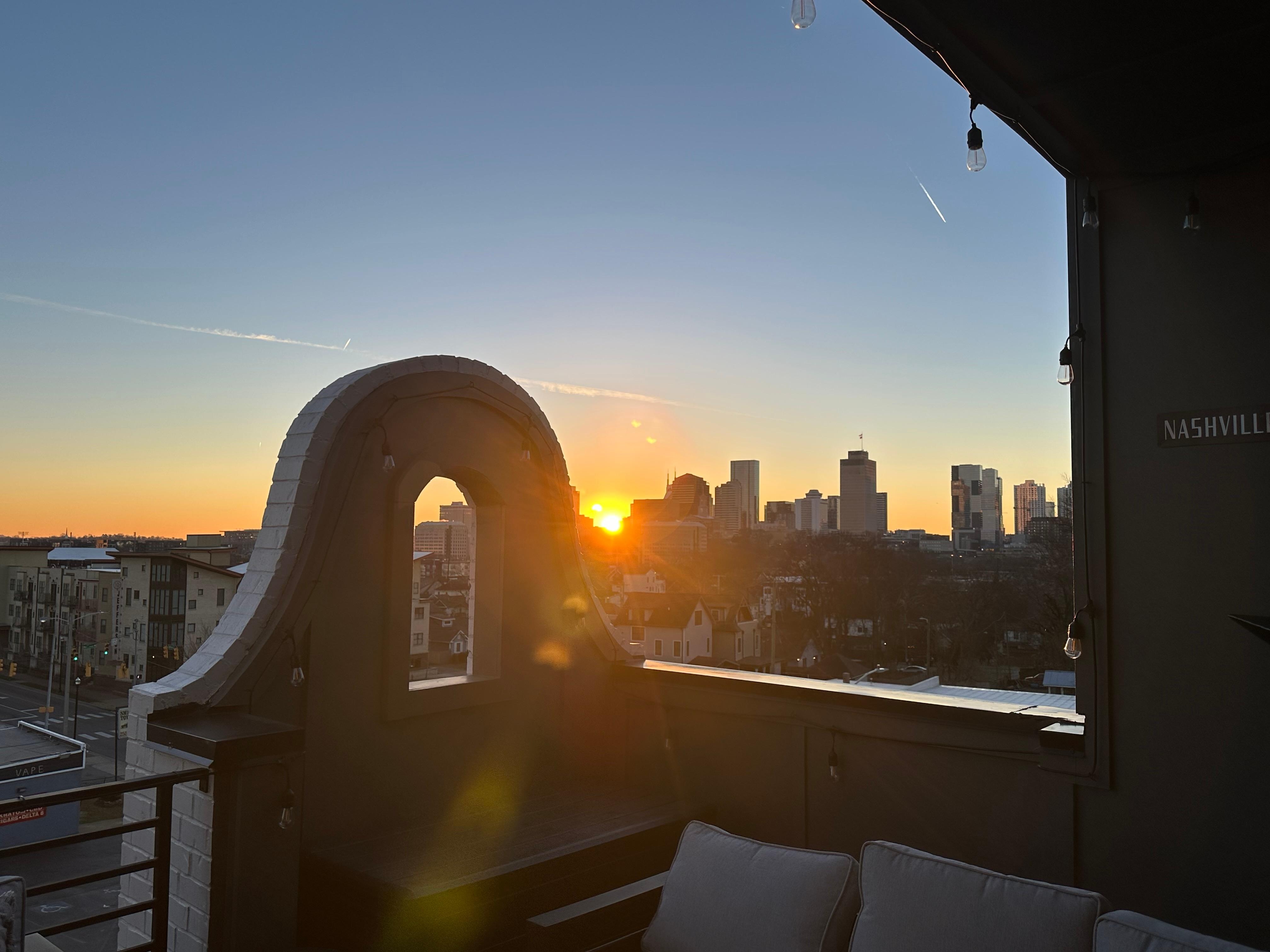Sunrise on 4th floor patio overlooking downtown