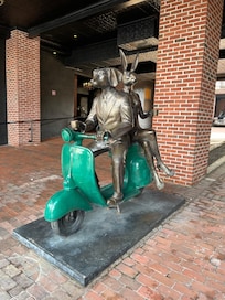 At entrance of hotel