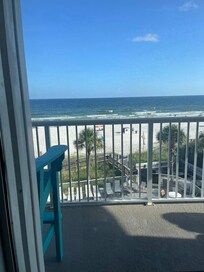 Best part of the trip! Relaxing on the balcony with beach views!