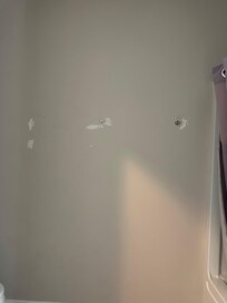 Bullet hole in front door.