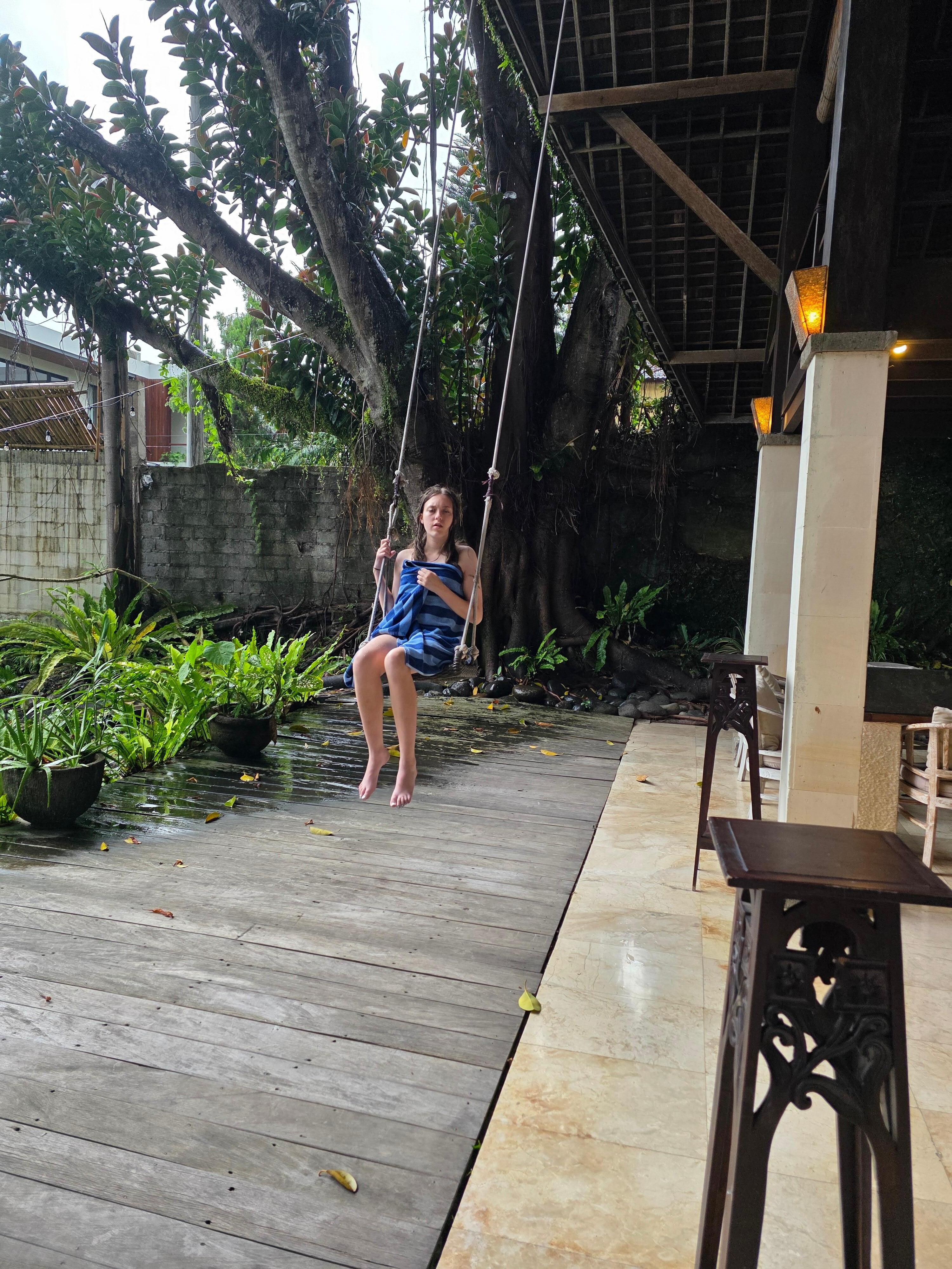 Enjoying the swing at the villa