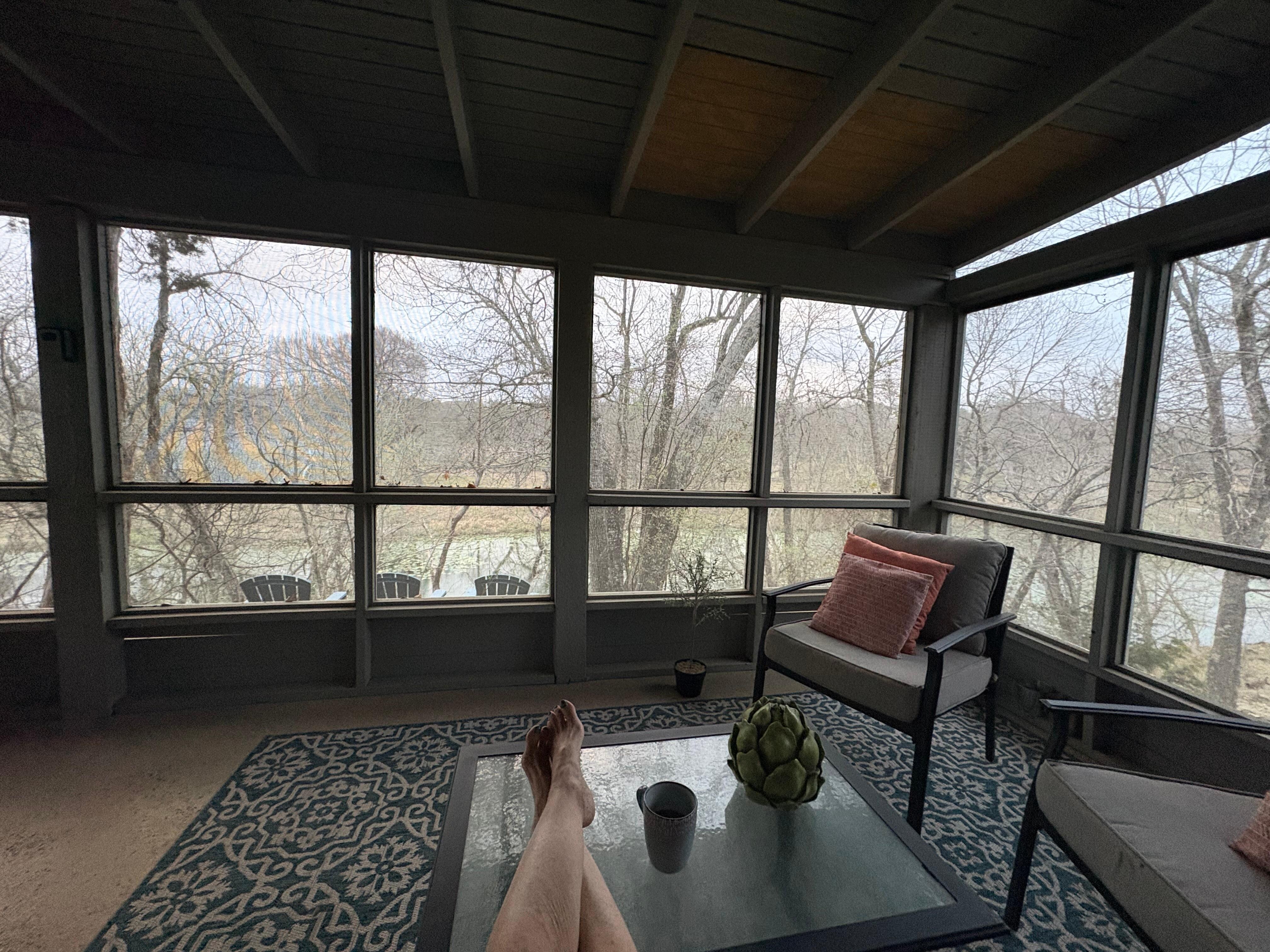 Morning coffee ☕️ on screened-in porch