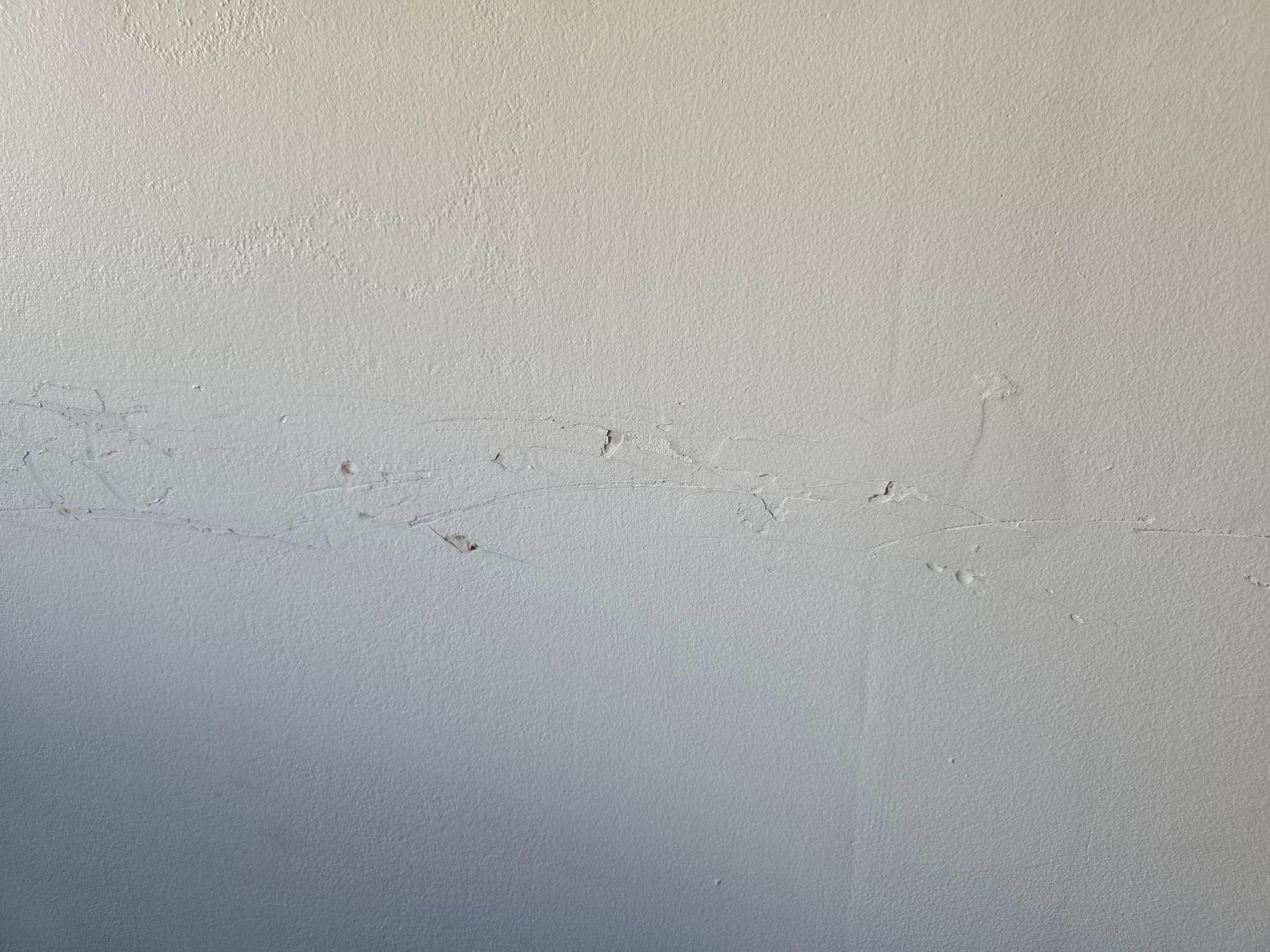 Walls marked up and damaged