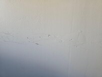 Walls marked up and damaged