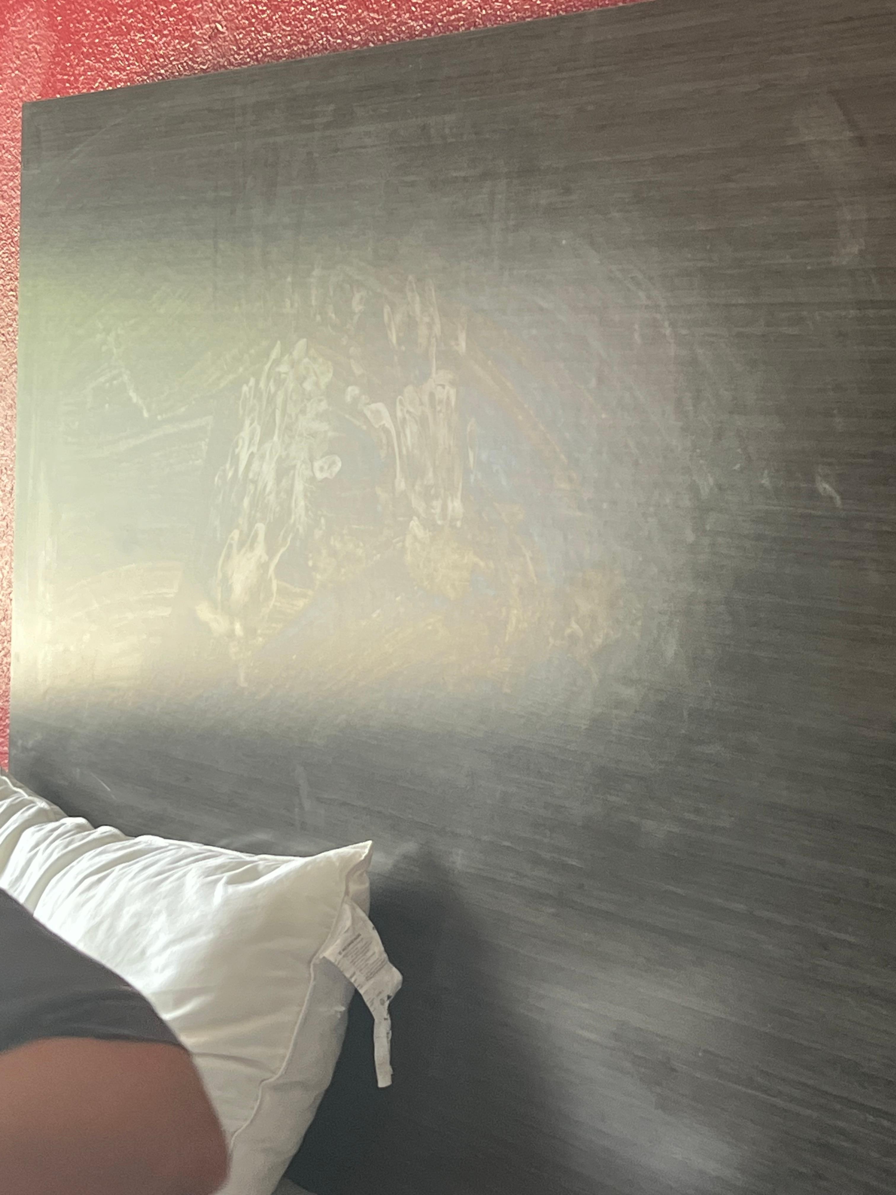 headboard covered with hand prints and a gelatinous substance ? semen