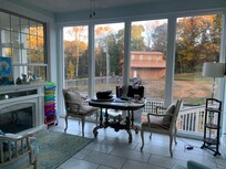 Sun room overlooking horse pasture & barn.