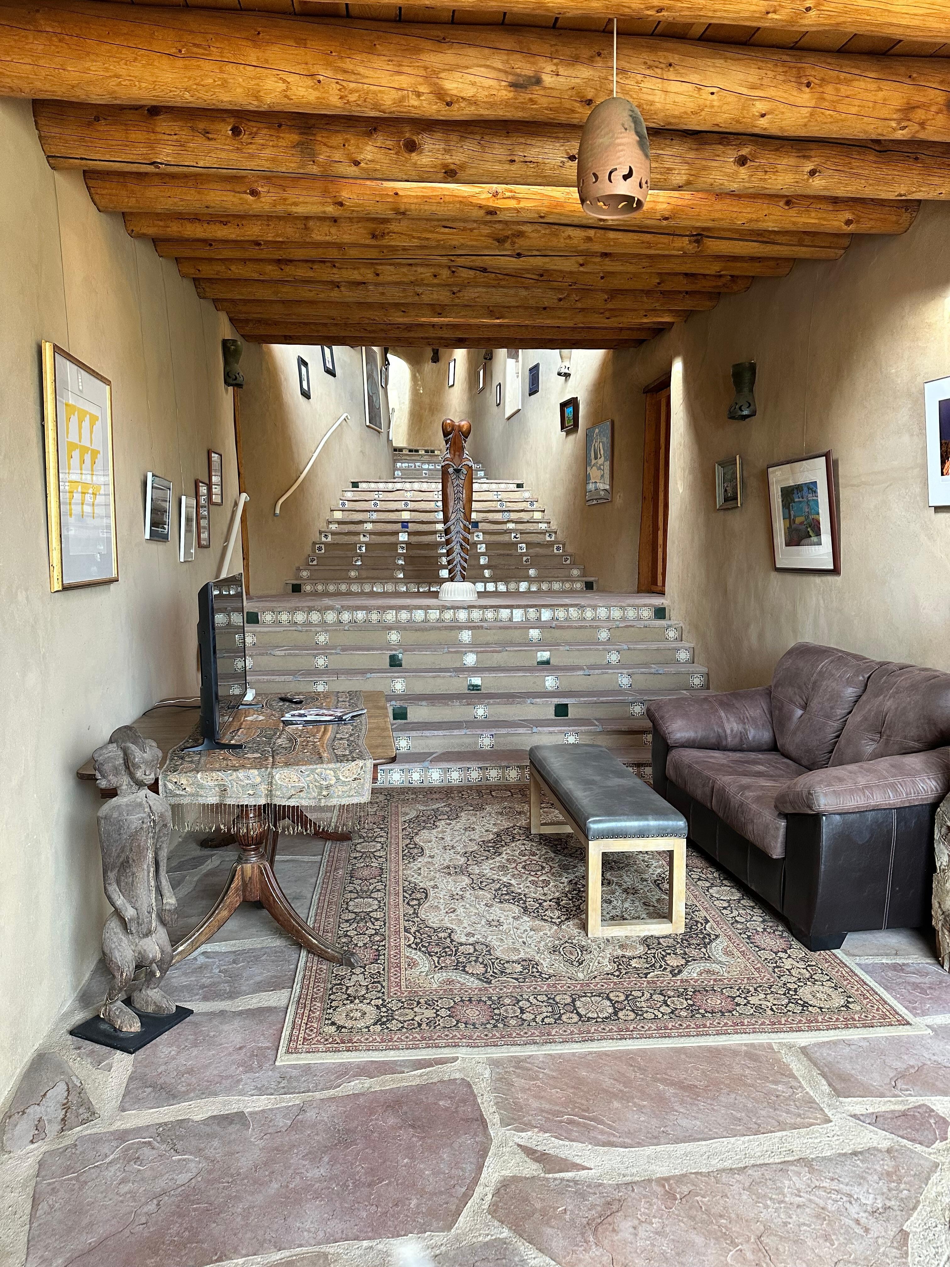 Private entrance and stairway to main level.