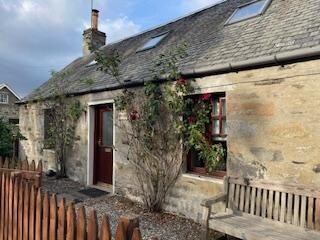 The front of the cottage ~ perfect place to sit and enjoy a cuppa.