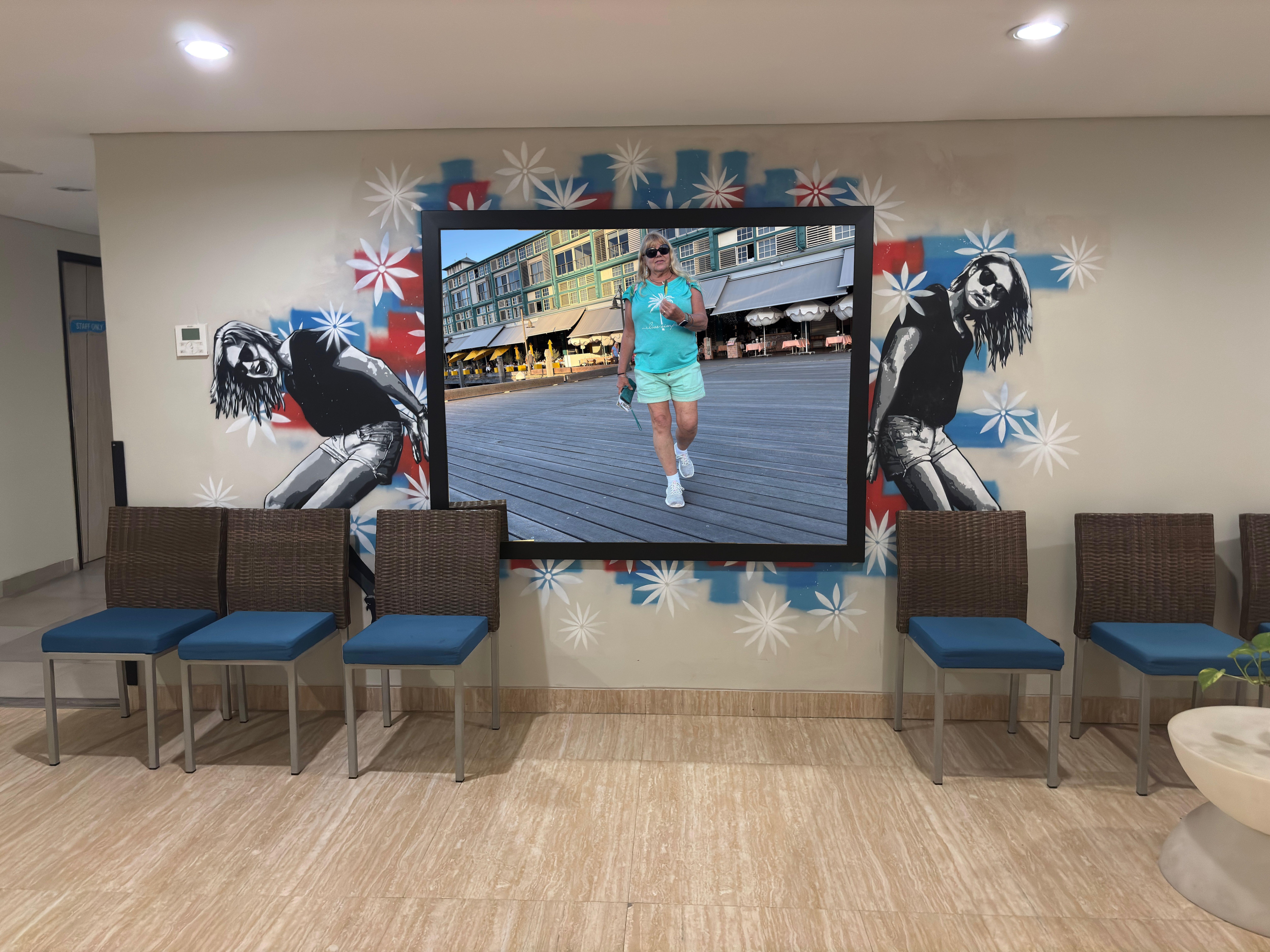 Just being silly by pretending this big mirror in the hall was a tv.  My husband photoshopped me in it’