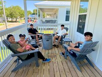 Boys chilling on the front porch.