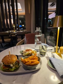 Beef brie burger with fries and cesar salad