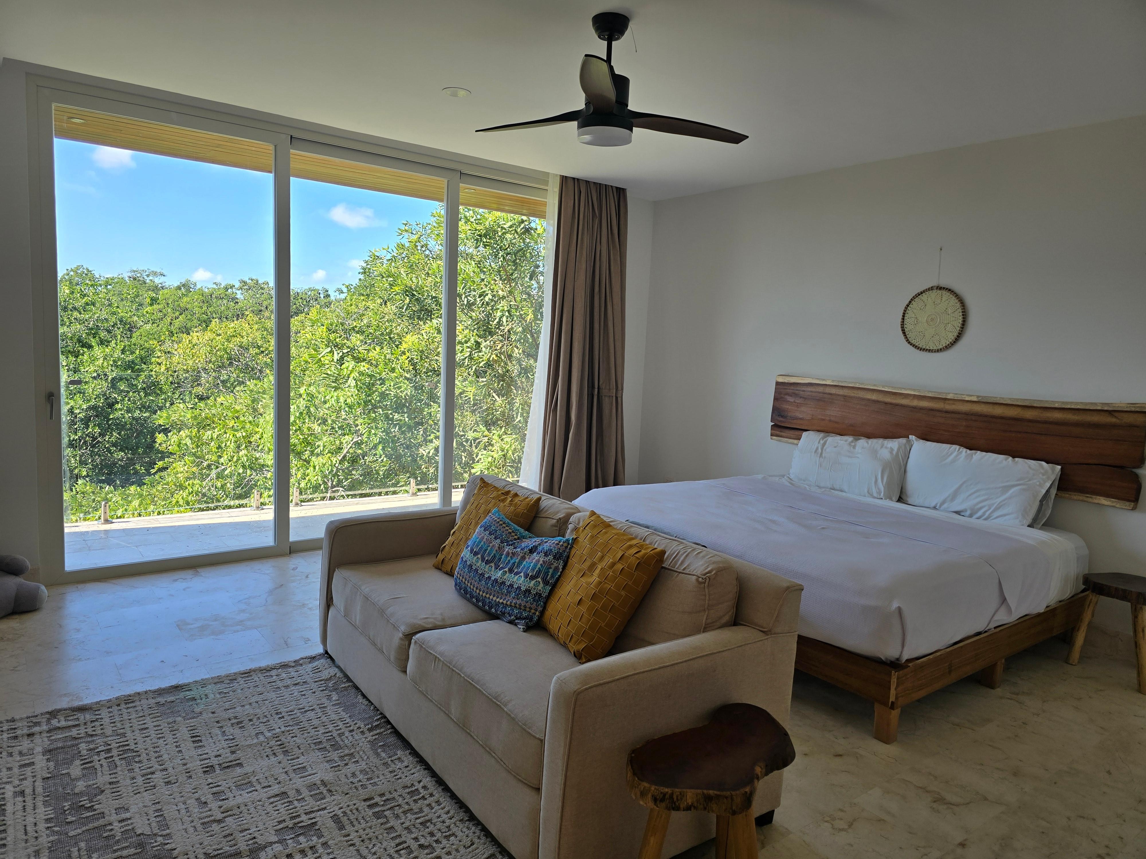 Master bedroom with bar and huge bathroom w walk in closet