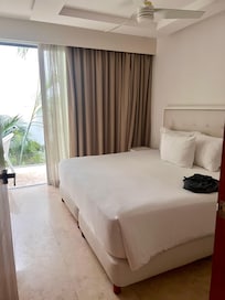 Bedroom with king bed and bathroom