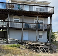Large rotting wood pile and decaying furniture