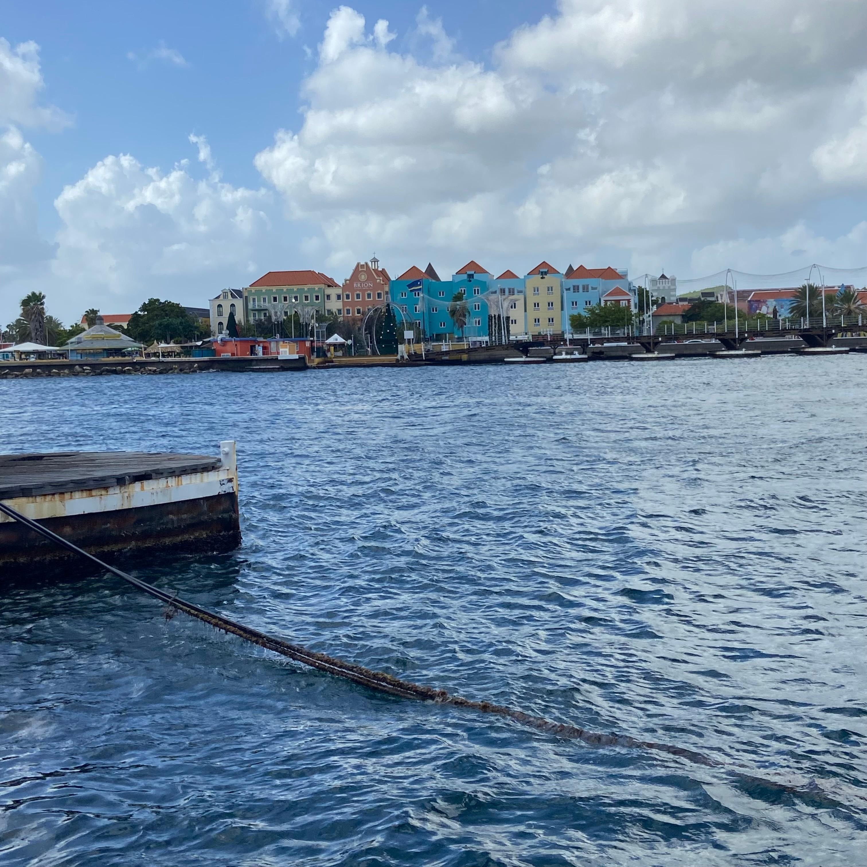 View of Punda Dutch houses from Queen Emma Bridge in historic Willemstad