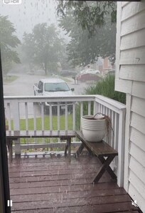 Took a video but screen shot gives you an idea of the low gutter and gutters pouring water at the front door.