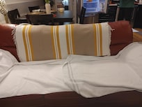 Covered the couch in towel because of what we saw after wiping.