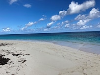 The point between Shoal Bay and east Shoal Bay.