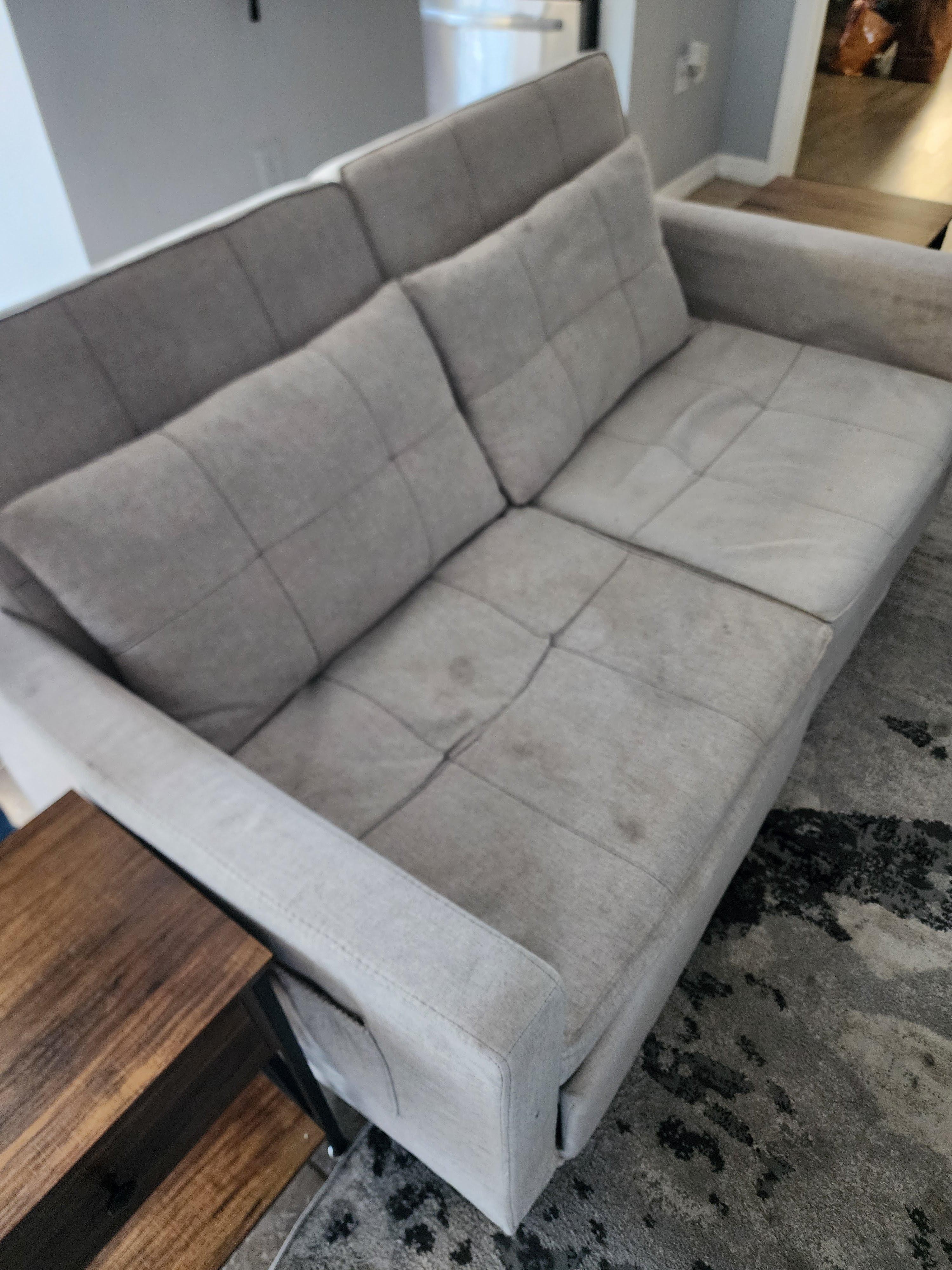 Stained covered couch. 