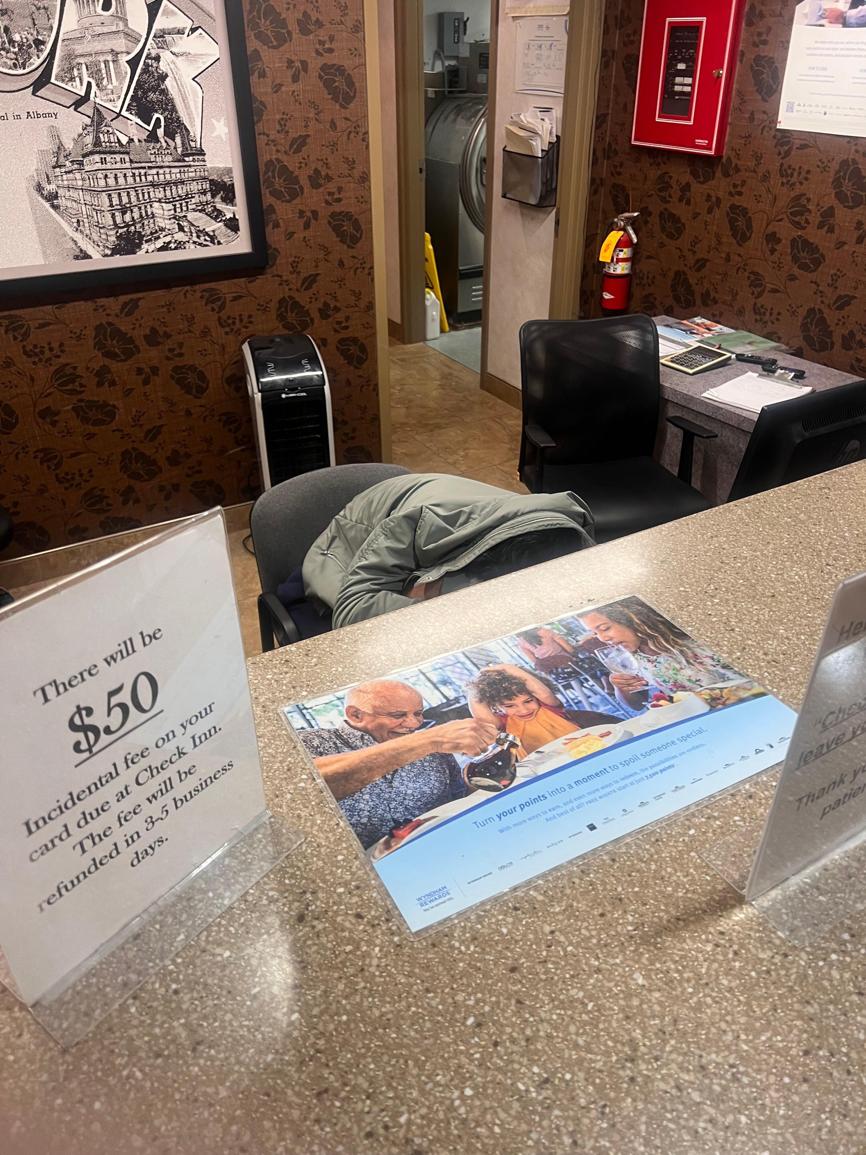 Receptionist sleeping through his shift. 
