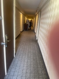 hallway leading to door outside