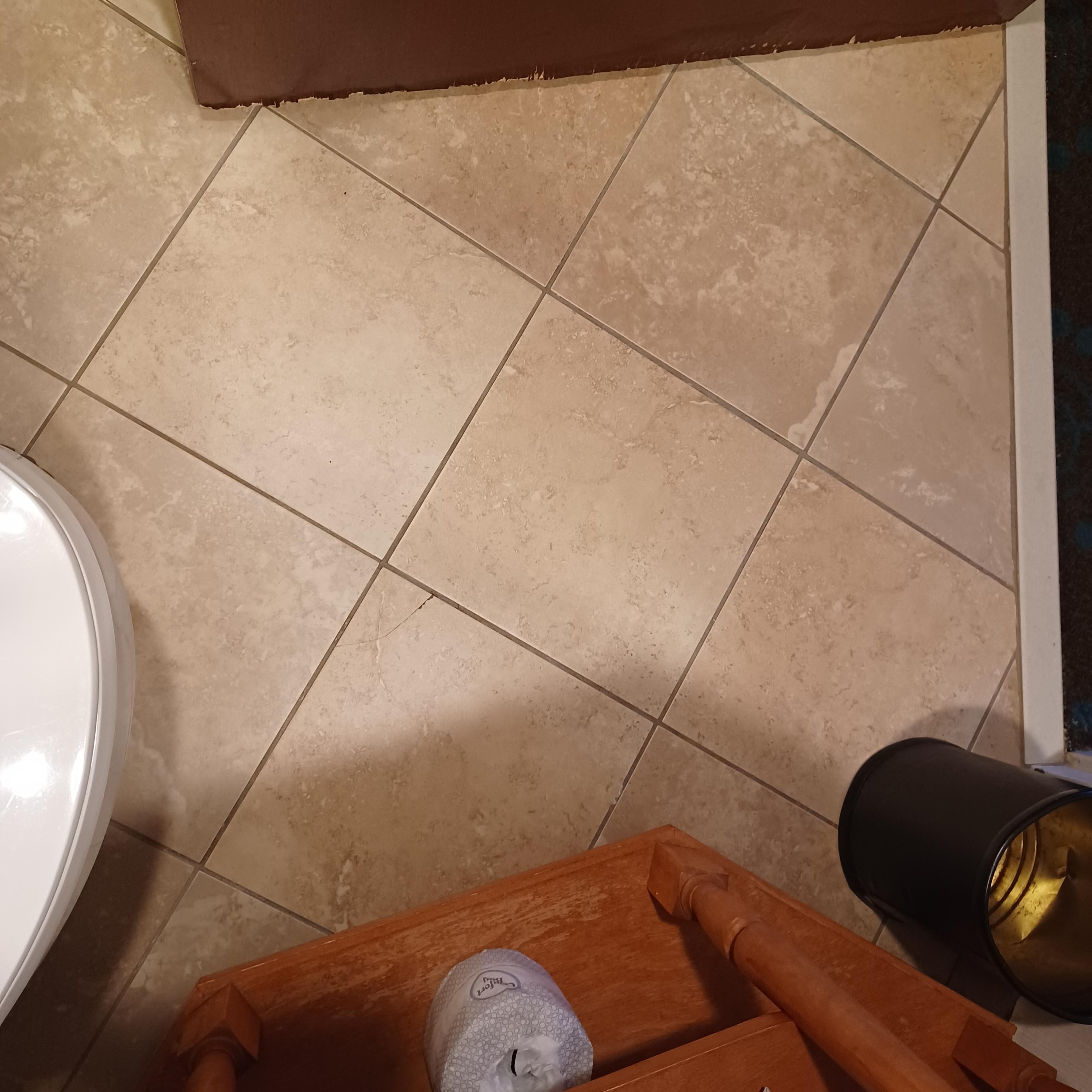 Tiled floor and wooden wash stand