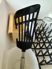 Broken utensils, floppy dirty spatula.