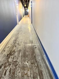 This is the aftermath of debris from the fire alarm in the hallways near a unit. Particles were escaping from this dust into our unit, maybe from the doorway.