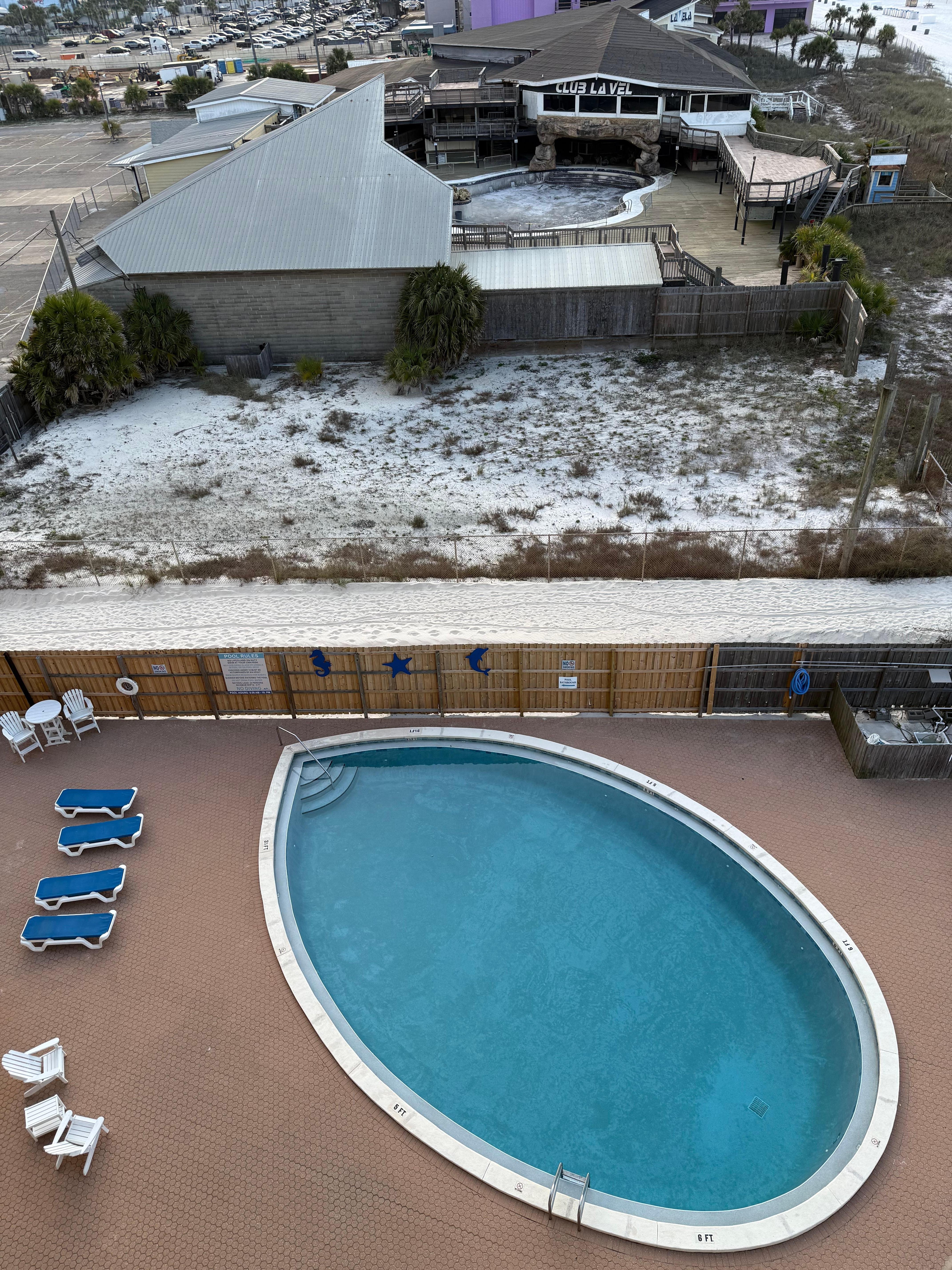 View of swimming pool from unit 702 balcony