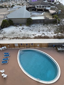 View of swimming pool from unit 702 balcony