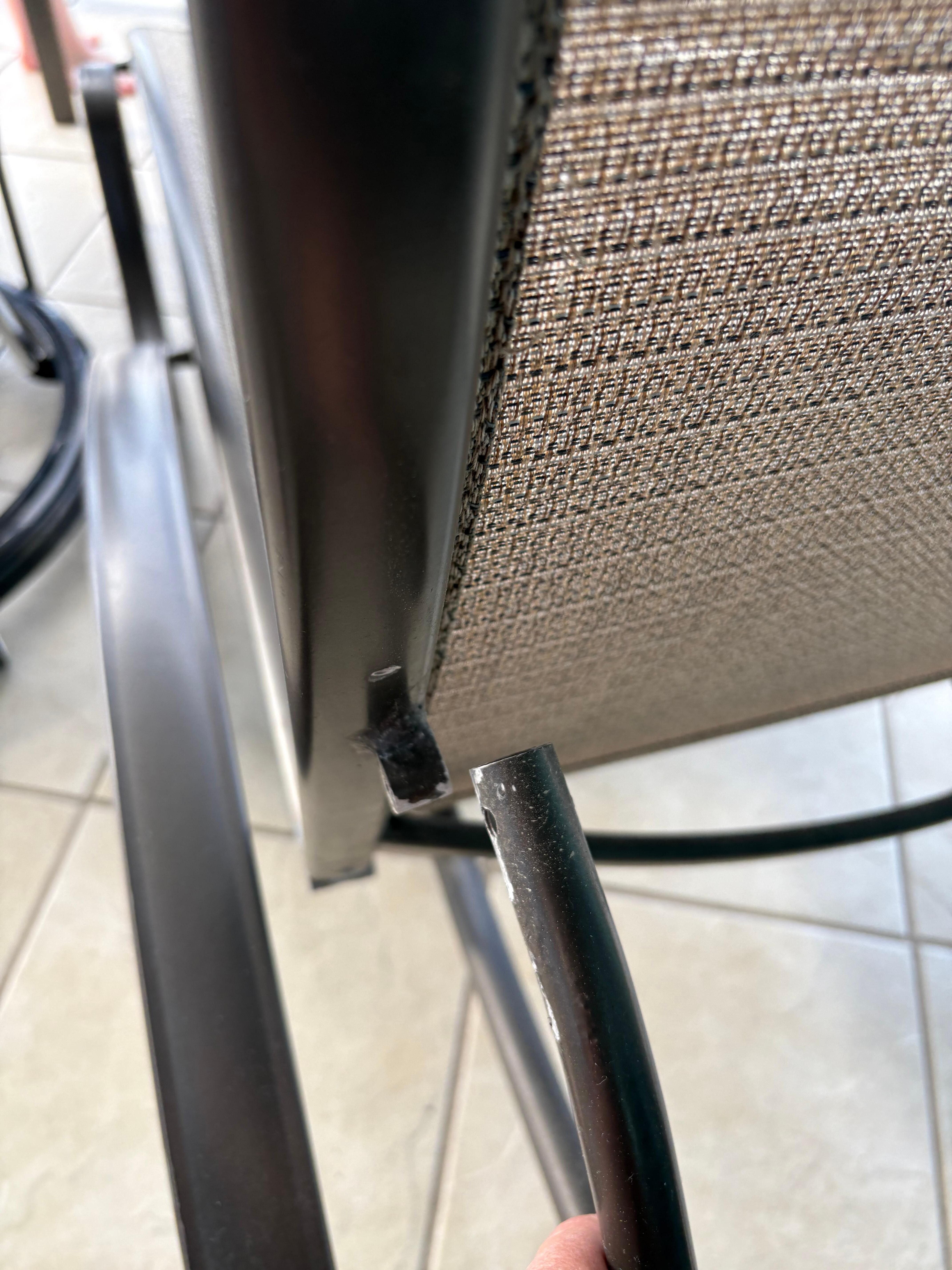 Broken lounge chair on balcony. Unusable. 