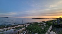 Sun setting late, just after 9p
