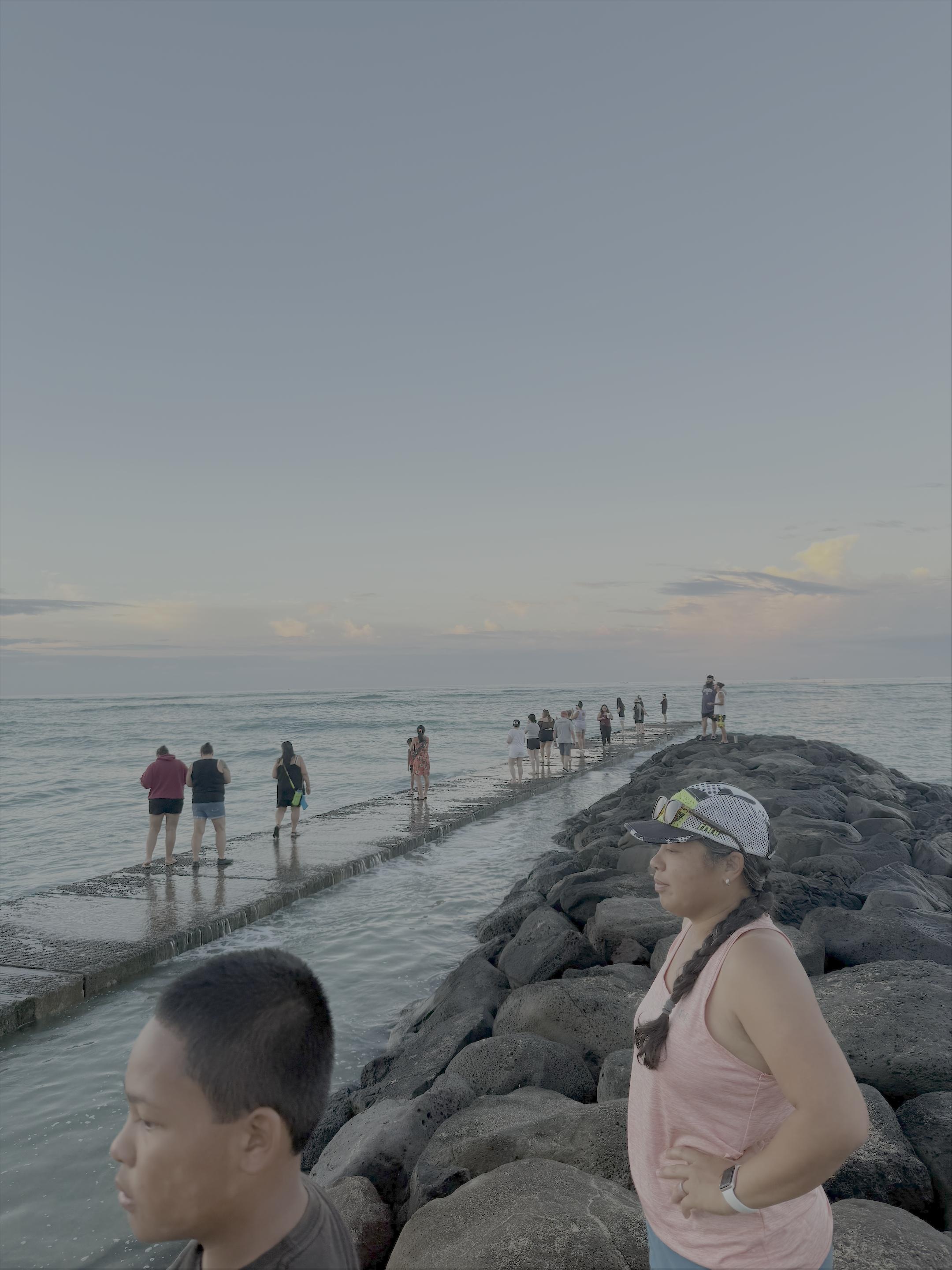 Jetti at Waikiki Beach.  Lots of visitors come here to catch the sun rise over the mountains and buildings.
