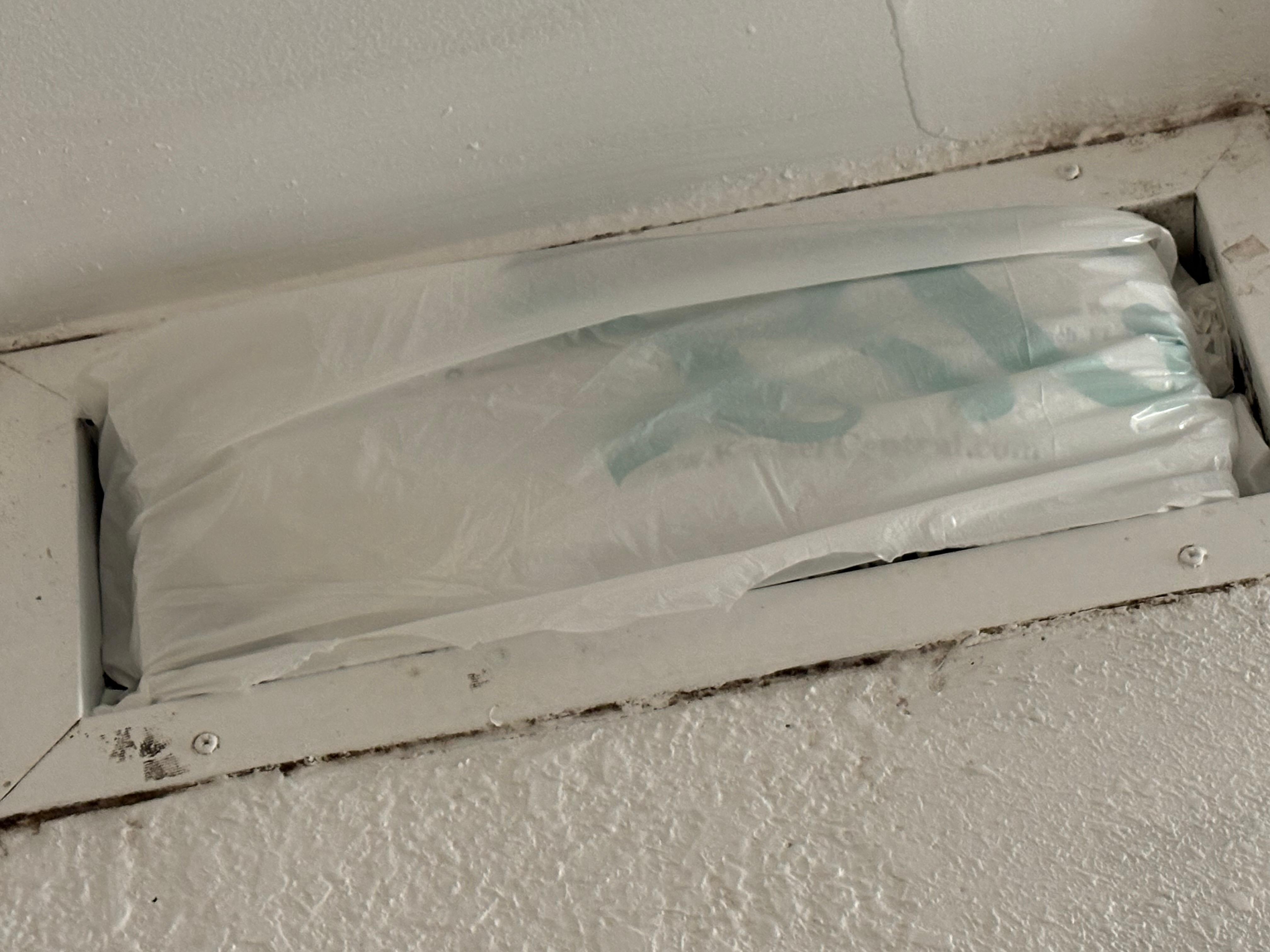 This air conditioning vent was covered with a plastic bag by the manager