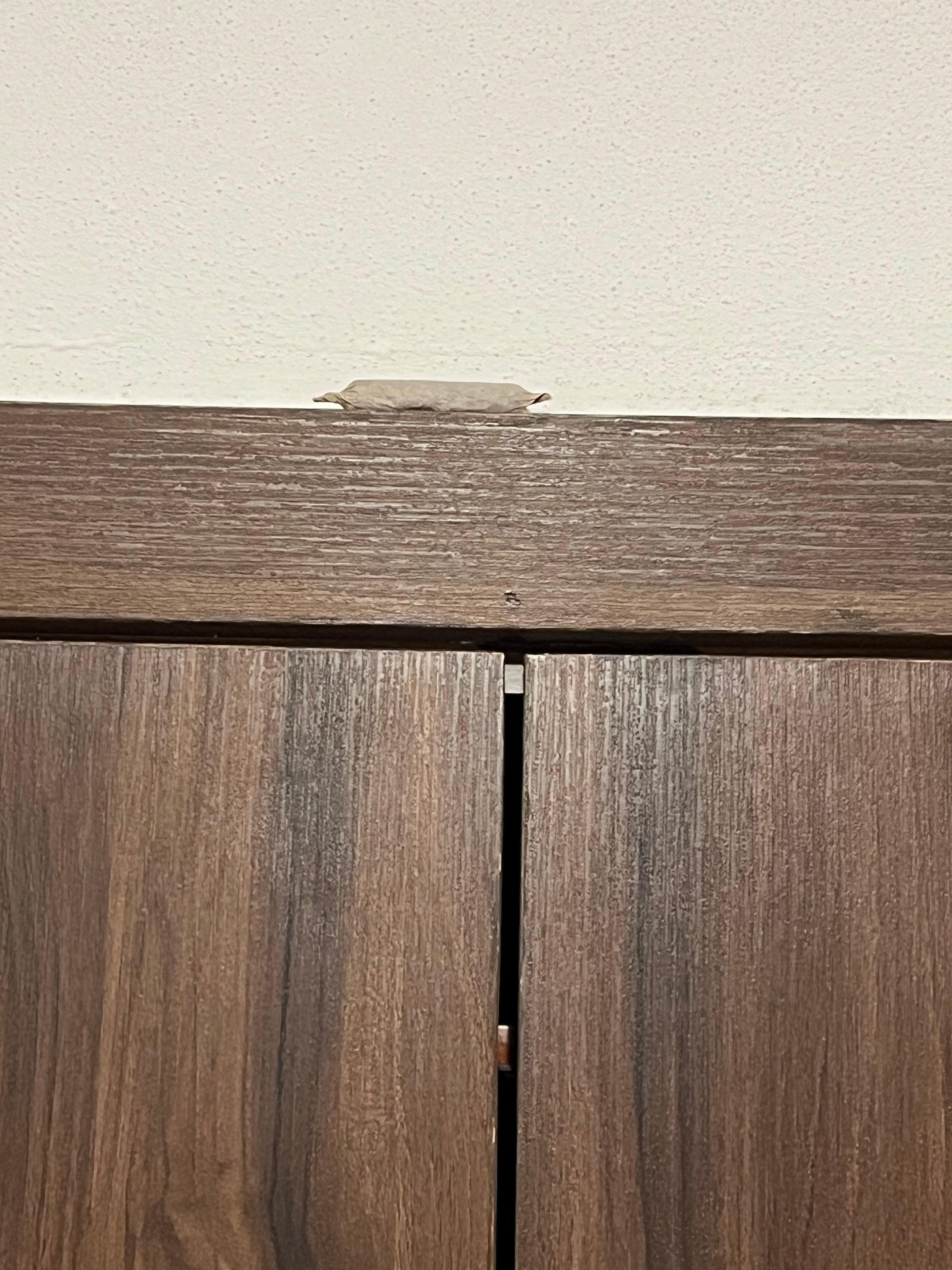 Illegal drugs up on top of trim left by?