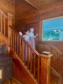 Flower girls coming down the stairs