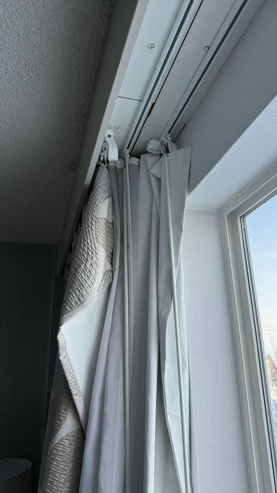 Curtains falling off track