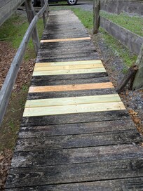 Had a problem with some of the boards on the fronr walkway, someone quickly repaired them