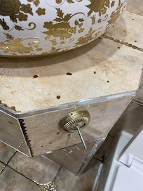 screw next to the sink