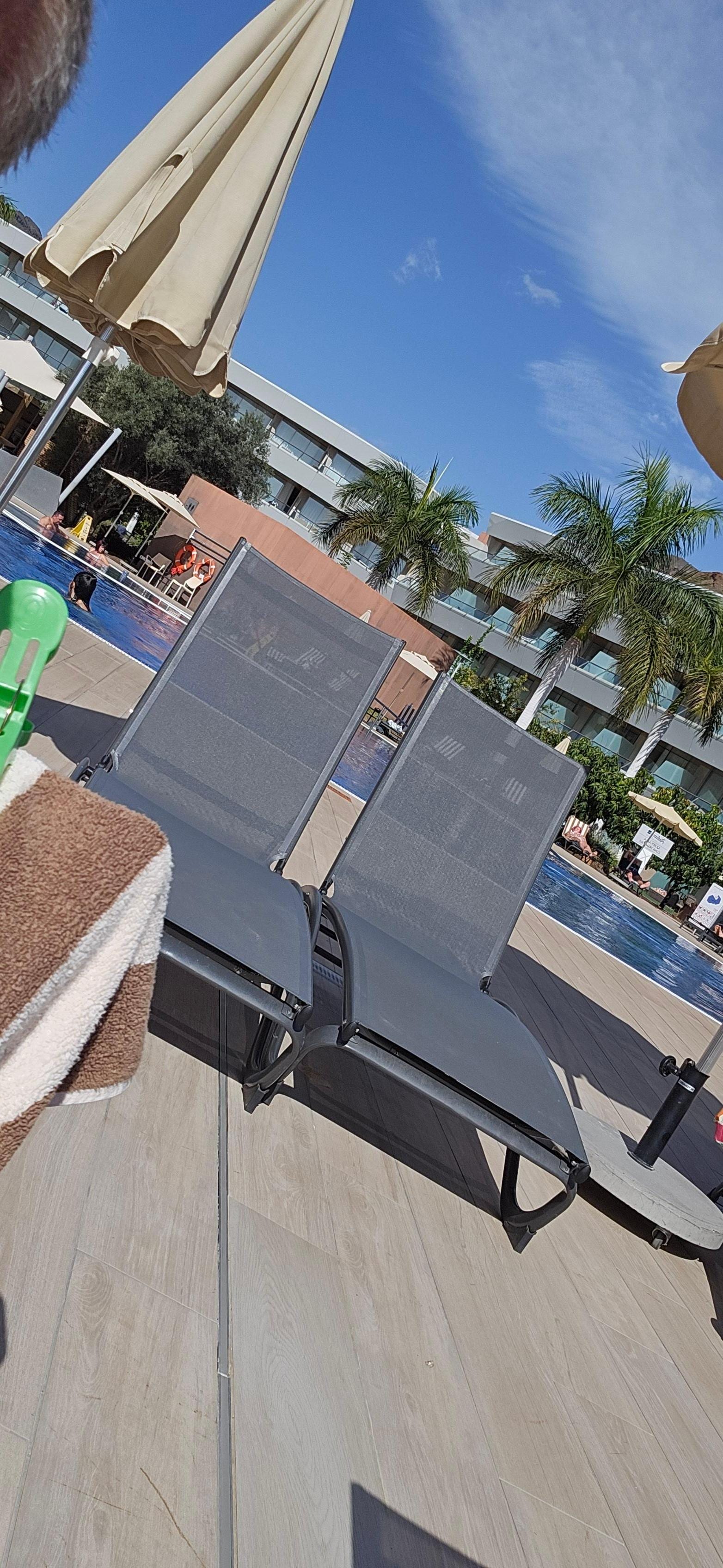 Good space by the pools, food and drinks served from pool-bar 