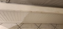 ledge next to bed (entry side)
