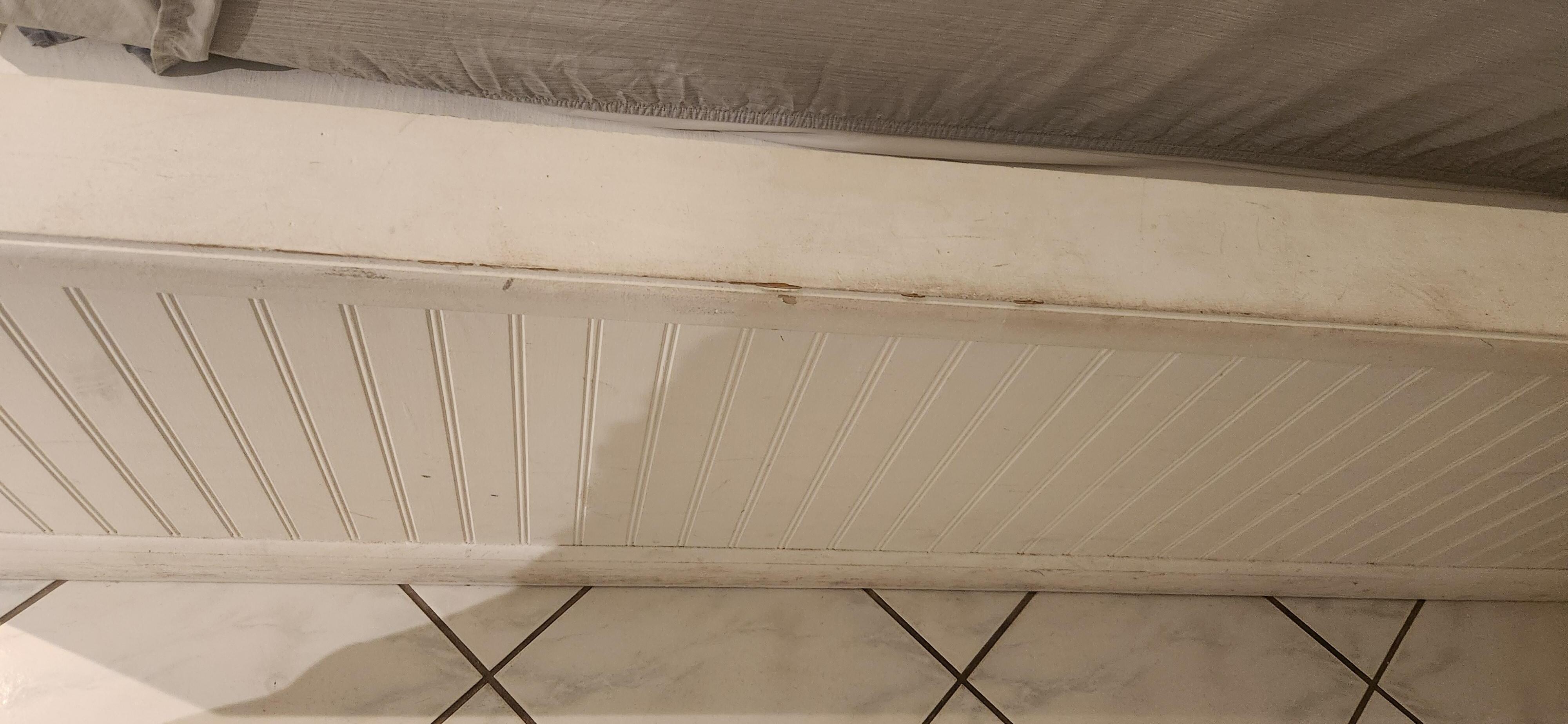 ledge next to bed (entry side)