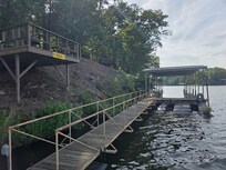 Floating dock looking at boat shed